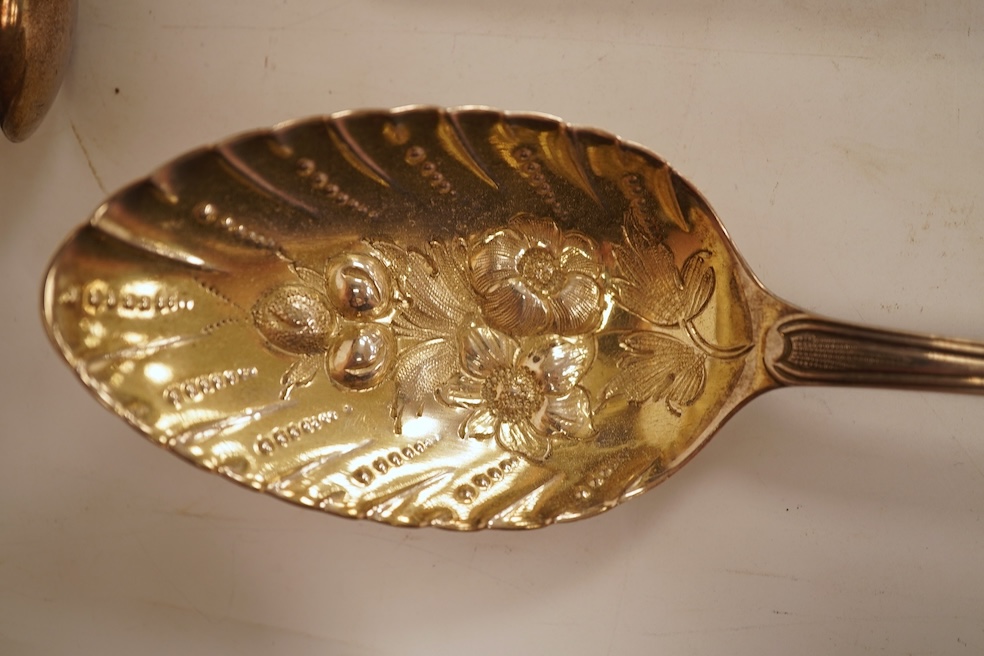 A pair of George III silver Old English pattern berry spoons, by Eley, Fearn & Chawner, London, 1810, 22.1cm, together with three Victorian silver fiddle pattern teaspoons, 6.8oz, together with a pair of plated sugar ton